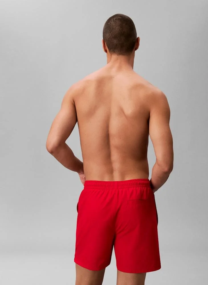 CALVIN KLEIN  Solid Swim Shorts for Men | Best Price UAE